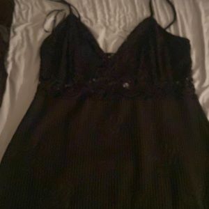 Black mid-length spaghetti strap dress